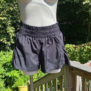 Free People Movement active wear shorts over panty with phone pockets size S.